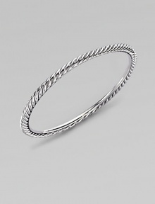 A simply twisted cable bangle of sterling silver is the essence of Yurman style. Sterling silver Cable, 4mm Diameter, about 2½ Made in USA