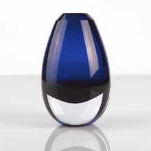 A uniquely artful piece that's mouth blown, then cut and polished by hand, bringing modern sophistication and a touch of the sublime into your home. A uniquely artful piece that's mouth blown, then cut and polished by hand, bringing modern sophistication and a touch of the sublime into your home.