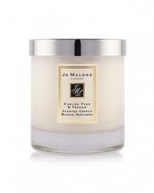 Experience the surprising, sensuous freshness of sweet pears, wrapped in a bouquet of white freesias, on a subtle background of scrambling wild roses and skin-warming amber, pathouli and woods. English Pear & Freesia Home Candle envelops a room and lingers for hours to create an ambience that is fresh and unexpected. Candle burn time is 45 hours. Experience the surprising, sensuous freshness of sweet pears, wrapped in a bouquet of white freesias, on a subtle background of scrambling wild roses and skin-warming amber, pathouli and woods. English Pear & Freesia Home Candle envelops a room and lingers for hours to create an ambience that is fresh and unexpected. Candle burn time is 45 hours.