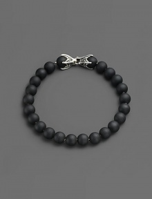A versatile look that matches any ensemble, is laced with matte onyx beads and joined together by a sterling silver chevron clasp.Sterling silver chevron clasp8 mm beadsAbout 8½ longImported A versatile look that matches any ensemble, is laced with matte onyx beads and joined together by a sterling silver chevron clasp.Sterling silver chevron clasp8 mm beadsAbout 8½ longImported