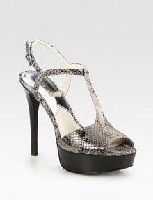 Entrance-making platform silhouette of snakeskin-embossed leather, with an adjustable ankle strap and notice-me heel. Stacked heel, 4½ (115mm)Covered platform, 1 (25mm)Compares to a 3½ heel (90mm)Snakeskin-embossed leather upperLeather liningRubber solePadded insoleImported Entrance-making platform silhouette of snakeskin-embossed leather, with an adjustable ankle strap and notice-me heel. Stacked heel, 4½ (115mm)Covered platform, 1 (25mm)Compares to a 3½ heel (90mm)Snakeskin-embossed leather upperLeather liningRubber solePadded insoleImported