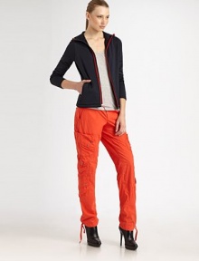 A fresh take on traditional athletic wear, this lightweight style features contrast piping and zipper. Plus, its storm flap offers impeccable protection against the elements. Attached hoodZip frontLong sleevesOn-seam zip pocketsAbout 24 long from shoulder to hem53% polyester/38% nylon/9% elastaneMachine washImported Model shown is 5'10 (177 cm) wearing US size Small. A fresh take on traditional athletic wear, this lightweight style features contrast piping and zipper. Plus, its storm flap offers impeccable protection against the elements. Attached hoodZip frontLong sleevesOn-seam zip pocketsAbout 24 long from shoulder to hem53% polyester/38% nylon/9% elastaneMachine washImported Model shown is 5'10 (177 cm) wearing US size Small.