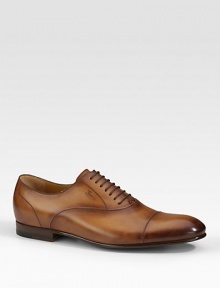 Cap-toe leather shoe with embossed gucci script logo. Leather sole Made in Italy Please note: For best fit, please size down one full size. Cap-toe leather shoe with embossed gucci script logo. Leather sole Made in Italy Please note: For best fit, please size down one full size.