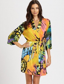 Cross the freshness of a bold print with vivid colors for a luxe silhouette rendered in cool, ultra-smooth fabric. Three-quarter length sleevesSelf-tie waistBack smocked waistbandAbout 35 from shoulder to hem92% polyester/8% spandexMachine washImported Cross the freshness of a bold print with vivid colors for a luxe silhouette rendered in cool, ultra-smooth fabric. Three-quarter length sleevesSelf-tie waistBack smocked waistbandAbout 35 from shoulder to hem92% polyester/8% spandexMachine washImported