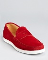 Penny loafers rendered in quality suede and updated with modern, sporty details for a wear-anywhere casual shoe.