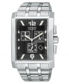 Refined style and everyday functionality come together in this bold watch from Citizen. Silvertone stainless steel bracelet and rectangular case. Rectangular black dial with three subdials, date window and numeral indices. Analog movement. Water resistant to 50 meters. Five-year limited warranty.