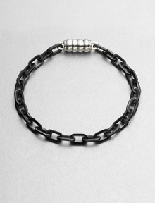 Intricate links of sterling silver and stainless steel offers a remarkably modern contrast to your classic, polished ensemble.Sterling silver/stainless steelAbout 3 diam.Imported Intricate links of sterling silver and stainless steel offers a remarkably modern contrast to your classic, polished ensemble.Sterling silver/stainless steelAbout 3 diam.Imported