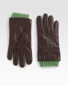 Luxurious winter essential enhanced by vertical dart detail in fine leather.LeatherDry cleanImported
