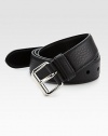 Remarkable style and versatility, set in textured leather with metal buckle.LeatherAbout 1¼ wideMade in Italy