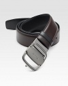 Sleek reversible design rendered in Italian leather, finished with an adjustable signature vara buckle.CalfskinRuthenium buckleAbout 1½ wideMade in Italy