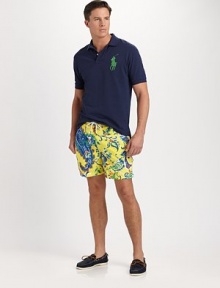 A vibrant paisley pattern enlivens an essential swim trunk in quick-drying microfiber.Shoestring waistVelcro® flySide slash, back patch pocketsMesh liningInseam, about 6PolyesterMachine washImported A vibrant paisley pattern enlivens an essential swim trunk in quick-drying microfiber.Shoestring waistVelcro® flySide slash, back patch pocketsMesh liningInseam, about 6PolyesterMachine washImported