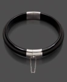 Add drama to any outfit with this smooth sterling silver onyx (10.5 x 13 mm) bangle bracelet. Approximate diameter: 2-1/2 inches. Add drama to any outfit with this smooth sterling silver onyx (10.5 x 13 mm) bangle bracelet. Approximate diameter: 2-1/2 inches.