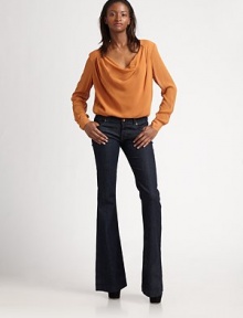 Draped at the neck and pleated at the shoulder, the everyday blouse gets elegant in soft silk.Seamed shoulders Long sleeves with button cuffs Gathers at center back yoke About 26 from shoulder to hem Fully lined Dry clean Imported Draped at the neck and pleated at the shoulder, the everyday blouse gets elegant in soft silk.Seamed shoulders Long sleeves with button cuffs Gathers at center back yoke About 26 from shoulder to hem Fully lined Dry clean Imported