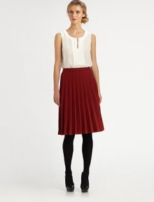 Delightfully feminine, this simple silk top is sweetly tailored with crisp front pleats, to wear out or in.Round band neckline with V notchSleevelessAbout 24 from shoulder to hemSilkDry cleanImportedSIZE & FITModel shown is 5'10½ (179cm) wearing US size 4. Delightfully feminine, this simple silk top is sweetly tailored with crisp front pleats, to wear out or in.Round band neckline with V notchSleevelessAbout 24 from shoulder to hemSilkDry cleanImportedSIZE & FITModel shown is 5'10½ (179cm) wearing US size 4.