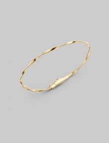 Simply stunning, this 18k gold bangle with delicate ridges and twists is great on its own, even better when stacked in multiples. 18k goldDiameter, about 2½Tongue-and-groove claspImported Please note: Bracelets sold separately. Simply stunning, this 18k gold bangle with delicate ridges and twists is great on its own, even better when stacked in multiples. 18k goldDiameter, about 2½Tongue-and-groove claspImported Please note: Bracelets sold separately.