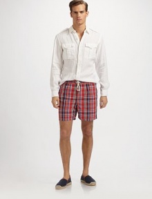 A quick-dry swim classic ideal for everyday swims and holiday jaunts alike, crafted with a standard fit and preppy plaid checks. Drawstring elastic waist Logo embroidery Side slash, patch pockets Mesh lining Inseam, about 4¾ 52% cotton/48% nylon; machine wash Imported A quick-dry swim classic ideal for everyday swims and holiday jaunts alike, crafted with a standard fit and preppy plaid checks. Drawstring elastic waist Logo embroidery Side slash, patch pockets Mesh lining Inseam, about 4¾ 52% cotton/48% nylon; machine wash Imported