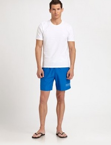 These stylish solid swim trunks sport a drawstring waistband and the classic BOSS logo.Elastic drawstring waistSlash side pocketsInseam, about 6Polyester liningPolyamideMachine washImported These stylish solid swim trunks sport a drawstring waistband and the classic BOSS logo.Elastic drawstring waistSlash side pocketsInseam, about 6Polyester liningPolyamideMachine washImported