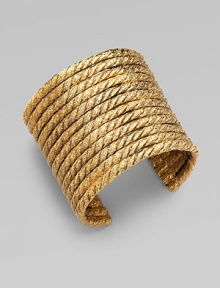 A simply chic, statement piece in radiant goldtone. Goldtone tinSlip-on styleDiameter, about 2¼Made in Italy A simply chic, statement piece in radiant goldtone. Goldtone tinSlip-on styleDiameter, about 2¼Made in Italy