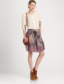 Tied cuffs and dropped shoulders add a fashionable finish to this lengthy silk confection. ScoopneckButton frontDropped shouldersShort sleeves with self ties at cuffsLonger length hits below the hipsFully linedSilkDry cleanImportedModel shown is 5'10 (177cm) wearing US size Small. Tied cuffs and dropped shoulders add a fashionable finish to this lengthy silk confection. ScoopneckButton frontDropped shouldersShort sleeves with self ties at cuffsLonger length hits below the hipsFully linedSilkDry cleanImportedModel shown is 5'10 (177cm) wearing US size Small.