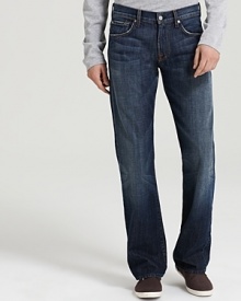 7 For All Mankind's Brett jeans evoke a classic, timeless style, faded and distressed for a rougher, worn-in appearance that matches your laid-back attitude.
