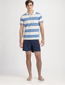 A summer wardrobe essential, shaped with an easy fit and brightly colored side panels.Drawstring elastic tie waistBack welt pocketInseam, about 3PolyesterMachine washImported A summer wardrobe essential, shaped with an easy fit and brightly colored side panels.Drawstring elastic tie waistBack welt pocketInseam, about 3PolyesterMachine washImported