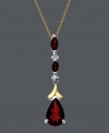 A drop of elegance to heighten your look. Bold garnet gemstones (1-3/4 ct. t.w.) in pear and marquise shapes combine with sparkling diamond accents in a sterling silver and 14k gold setting. Approximate length: 18 inches. Approximate drop: 1-1/3 inches.