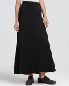 Take sleek style to new lengths in this Elie Tahari maxi skirt, featuring a subtle front slit.