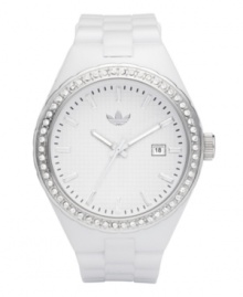 adidas glams up the classically sporty style of this Cambridge watch with crystals. White polyurethane strap and round plastic case. Silver tone bezel embellished with crystal accents. White grid-patterned dial features silver tone stick indices, minute track, date window at three o'clock, three hands and logo at twelve o'clock. Quartz movement. Water resistant to 50 meters. Two-year limited warranty.