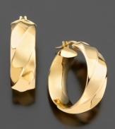 Classic 14k gold hoop earrings with a twist.  Approximate diameter: 3/4 inches.