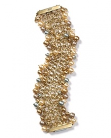 Teeming with tawny pearls, ABS by Allen Schwartz's gleaming bracelet is eye-catching. The attention-grabbing style loves frilly minis, heels and a full dance card. Teeming with tawny pearls, ABS by Allen Schwartz's gleaming bracelet is eye-catching. The attention-grabbing style loves frilly minis, heels and a full dance card.