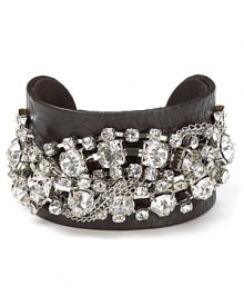 With embossed leather and chunky crystal accents, ABS by Allen Schartz' cuff makes a dazzling accent to day and after dark looks. Wear it to hint at tough-chic. With embossed leather and chunky crystal accents, ABS by Allen Schartz' cuff makes a dazzling accent to day and after dark looks. Wear it to hint at tough-chic.