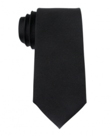 Stroke of genius. A signature solid tie like this look from Michael Kors makes a bold statement.