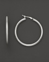 Simply chic, these 14K. white gold hoops are timeless classics.