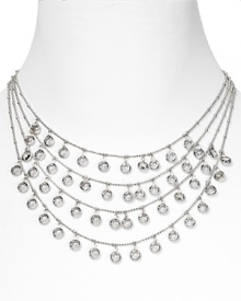Trip the light fantastic in this ABS by Allen Schwartz necklace, featuring four silver tone tiers of dazzling, delicate rhinestones. Trip the light fantastic in this ABS by Allen Schwartz necklace, featuring four silver tone tiers of dazzling, delicate rhinestones.