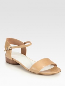 Classic essential in supple Italian leather, featuring an adjustable ankle strap and low stacked heel. Leather upperAdjustable ankle strapLeather lining and solePadded insoleMade in Italy Classic essential in supple Italian leather, featuring an adjustable ankle strap and low stacked heel. Leather upperAdjustable ankle strapLeather lining and solePadded insoleMade in Italy