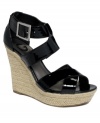 Look on the bright side. A colorblocked combination of bold hues makes the Describe platform sandals from G by GUESS stand out in style. With a braided straw platform and high wedge heel, they'll top your list of favorites.