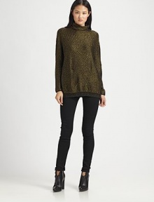 Master monochromatic textures with this slouchy, trend-smart turtleneck sweater with dropped shoulders and convenient slash pockets. TurtleneckDropped shouldersLong sleevesSlash pocketsRibbed hem69% merino wool/31% viscoseDry cleanImportedModel shown is 5'10 (177cm) wearing US size Small. Master monochromatic textures with this slouchy, trend-smart turtleneck sweater with dropped shoulders and convenient slash pockets. TurtleneckDropped shouldersLong sleevesSlash pocketsRibbed hem69% merino wool/31% viscoseDry cleanImportedModel shown is 5'10 (177cm) wearing US size Small.