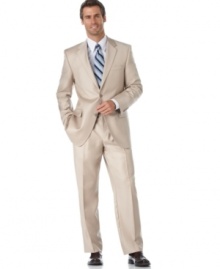 A smart addition to your spring and summer wardrobes, this lightweight Alfani tan suit helps you coordinate with a vibrant seasonal color palette.