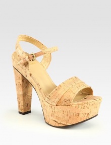 Natural cork platform sandal with a slight metallic finish and an adjustable ankle strap. Self-covered heel, 5 (125mm)Covered platform, 2 (50mm)Compares to a 3 heel (75mm)Metallic cork upperLeather liningRubber solePadded insoleImported Natural cork platform sandal with a slight metallic finish and an adjustable ankle strap. Self-covered heel, 5 (125mm)Covered platform, 2 (50mm)Compares to a 3 heel (75mm)Metallic cork upperLeather liningRubber solePadded insoleImported