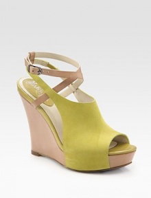 Vibrant suede slide with a chunky wedge and an adjustable, contrasting ankle strap. Self-covered wedge, 4½ (115mm)Covered platform, 1 (25mm)Compares to a 3½ heel (90mm)Suede and leather upperLeather lining and solePadded insoleImportedOUR FIT MODEL RECOMMENDS ordering one half size up as this style runs small. Vibrant suede slide with a chunky wedge and an adjustable, contrasting ankle strap. Self-covered wedge, 4½ (115mm)Covered platform, 1 (25mm)Compares to a 3½ heel (90mm)Suede and leather upperLeather lining and solePadded insoleImportedOUR FIT MODEL RECOMMENDS ordering one half size up as this style runs small.
