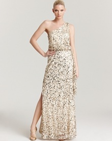 Make a glittering entrance in this sequin-encrusted Aidan Mattox one-shoulder gown, finished with a side slit and tie at the waist. Make a glittering entrance in this sequin-encrusted Aidan Mattox one-shoulder gown, finished with a side slit and tie at the waist.