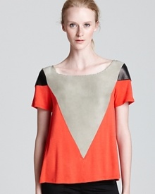 Geometric color-blocking in a luxe mix of textures infuse this AIKO top with statement chic.