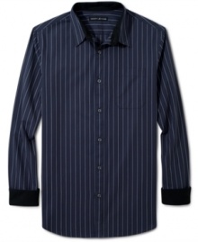 Great solo or under your favorite blazer or sweater, this DKNY Jeans button down is a classic. Great solo or under your favorite blazer or sweater, this DKNY Jeans button down is a classic.