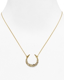 Catch good luck in this glittering 18 Kt. gold plate horseshoe, encrusted with starry Swarovski crystals. By Alexis Bittar. Catch good luck in this glittering 18 Kt. gold plate horseshoe, encrusted with starry Swarovski crystals. By Alexis Bittar.
