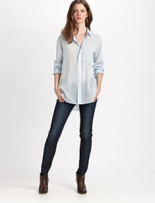 This wardrobe staple takes it's cues from menswear styling, impeccably tailored in a long,lean silhouette of cotton, silk and linen, lightly pinstriped.Point collarButton frontButton chest pocketShirttail hemBack princess seamsAbout 21 from shoulder to hem67% cotton/27% silk/6% linenMade in USA of imported fabricModel shown is 5'9½ (177cm) wearing US size 4. This wardrobe staple takes it's cues from menswear styling, impeccably tailored in a long,lean silhouette of cotton, silk and linen, lightly pinstriped.Point collarButton frontButton chest pocketShirttail hemBack princess seamsAbout 21 from shoulder to hem67% cotton/27% silk/6% linenMade in USA of imported fabricModel shown is 5'9½ (177cm) wearing US size 4.