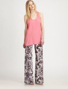Lush-floral print silk, long and lean in a flared silhouette.Tab-front waistBelt loopsZip-flyBack welt pocketsRise, about 9Inseam, about 38SilkDry cleanMade in USA of imported fabricModel shown is 5'9½ (176cm) wearing US size 4. Lush-floral print silk, long and lean in a flared silhouette.Tab-front waistBelt loopsZip-flyBack welt pocketsRise, about 9Inseam, about 38SilkDry cleanMade in USA of imported fabricModel shown is 5'9½ (176cm) wearing US size 4.