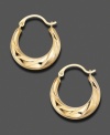Textured 14k gold makes these hoop earrings oh-so modern.