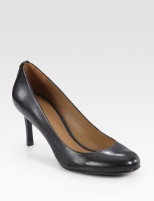 Glazed leather in a timeless silhouette with a substantial heel and round toe. Stacked heel, 2½ (65mm)Leather upperLeather lining and solePadded insoleImportedOUR FIT MODEL RECOMMENDS ordering true size. Glazed leather in a timeless silhouette with a substantial heel and round toe. Stacked heel, 2½ (65mm)Leather upperLeather lining and solePadded insoleImportedOUR FIT MODEL RECOMMENDS ordering true size.