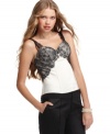 The corset tank from GUESS? adds some pizazz to the traditional tank. Pair it under a fitted blazer for sophisticated look.