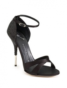 THE LOOKCrisscross strapsAnkle strap with buckle closureRhinestone studded heel with metal tipTHE FITHeel 4½ (115mm)THE MATERIALSatin upperMetal heelLeather lining and soleORIGINMade in Italy THE LOOKCrisscross strapsAnkle strap with buckle closureRhinestone studded heel with metal tipTHE FITHeel 4½ (115mm)THE MATERIALSatin upperMetal heelLeather lining and soleORIGINMade in Italy